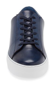 Polished leather elevates the look and feel of a streamlined sneaker that goes with everything and features a stretchy interior to keep every step secure. Lace-up style Removable insole Leather upper/synthetic lining/rubber sole Made in Portugal Leather Sneakers Men, Sneaker Men, Platform Slippers, Blue Fits, Kids Sandals, Fragrance Design, Fabric Gift Bags, Designer Clothes For Men, Modern Outfits