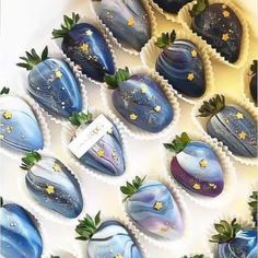 chocolate covered strawberries are arranged in the shape of heart shaped stars and moon shapes