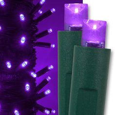 purple and green christmas lights are next to each other