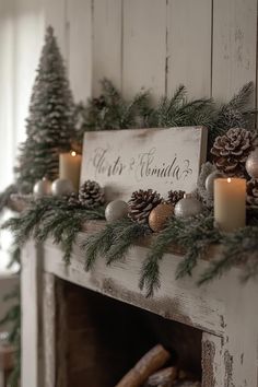 a mantel decorated with pine cones and candles