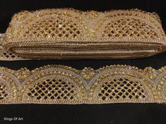 two pieces of gold colored beaded fabric