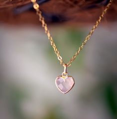 Looking for a unique accessory for some self love, or love for that special someone? Crafted from 14k gold filled and natural Rose Quartz, this pendant is the perfect, sparkling way to show anyone how much you care. Rose Quartz is a stone of love. It is believed to restore trust & harmony in relationships and encourage unconditional love. It purifies the heart and promotes self love, inner healing, and friendship. It is an alternate birthstone for January, as well as the spiritual birthstone for Delicate Jewelry With Heart Charm For Mom, Delicate Heart Charm Jewelry For Mom, Delicate Heart Charm Jewelry As Gift For Mom, Delicate Jewelry With Heart Charm For Mom's Gift, Delicate Heart Charm Jewelry Gift For Mom, Delicate Rose Gold Heart Necklace For Mother's Day, Delicate Pink Gold Jewelry For Gift, Feminine Heart-shaped Jewelry Gift, Feminine Heart-shaped Jewelry For Gifts