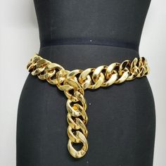 Marca:8888 China Queens
            
        Drag Queen accessories Looking to elevate your drag queen accessories game? Look no further than our Drag Queen Shop`s Versatile Belt Chain in a gorgeous gold color. Made from durable plastic, this waist chain is the perfect addition to any outfit, whether you`re on stage or off. With a width of 4cm and a length of 105cm, it`s the perfect size to make a statement without overpowering your look. Whether you`re looking to add a touch of glamour to a sim Trendy Gold Metal Body Jewelry, Gold Metal Body Chain, Trendy Metal Body Jewelry With Chain, Trendy Gold Body Chain, Trendy Gold Body Chain For Party, Trendy Gold Chain Body Chain For Party, Elegant Gold Body Chain With Chain Strap, Gold Metal Chain Belt For Parties, Gold Body Chain With Chain Strap