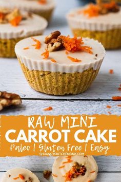 carrot cupcakes with white frosting and orange sprinkles on top