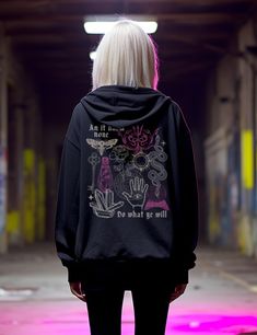 "If your size is not available, click this in the dropdown and select \"Let me know when it's back\" to get on the waitlist! Thank you for your patience and understanding! Immerse yourself in the cozy warmth of the witchcraft collage zip-up hoodie. Designed to embrace the colder months, these hoodies are the perfect outer layer for modern mystics seeking both comfort and style. Crafted from cotton/polyester blend, they provide a soft and warm embrace that keeps you snug while radiating an aura o Gothic Winter Hoodie With Graphic Print, Gothic Graphic Print Winter Hoodie, Winter Gothic Hoodie With Graphic Print, Witchy Long Sleeve Winter Outerwear, Gothic Hoodie With Graphic Print, Gothic Hooded Hoodie For Fall, Gothic Hooded Hoodie For Winter, Witchy Hooded Winter Outerwear, Design Hoodie