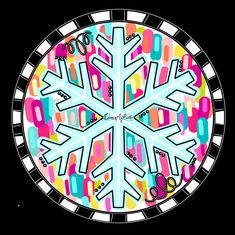 a colorful snowflake with scissors and other items in the center on a black background