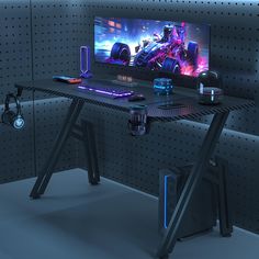 a gaming desk with a monitor and keyboard on it