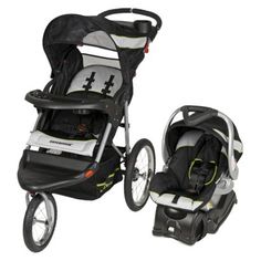 the stroller and infant car seat are both in black and white color combinations