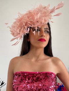 Delicate pink feather Ascot hat. Mixed range of pink feathers, including ostrich feathers. Worn either on the top or sides, even back of head.   Stunning piece of art on your head. Attached to the hair with a hair clip and also added hat string (not really needed). Very light and stable on the head. Available in other colours. Dare to be Different.... Shipped in 2 days Delivery to Europe within 5-8 working days Delivery to USA within 8-18 working days. Delivery to UK within 5-10 WORKING DAYS. De Feathered Mini Hats For Royal Ascot Races, Pink Ostrich Feather Fascinator, Ostrich Feather Headpiece For Kentucky Derby Party, Ostrich Feather Headpieces For Kentucky Derby Party, Kentucky Derby Ostrich Feather Headpiece For Party, Royal Ascot Feathered Mini Hats For Races, Mini Hats With Feathers For Royal Ascot Races, Royal Ascot Mini Hats With Feathers, Spring Party Mini Hat With Feather Trim