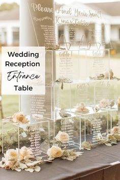 the wedding reception table is set up with clear acrylic