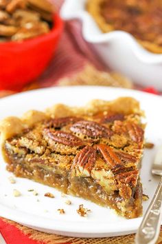 a slice of pecan pie on a white plate