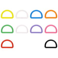 six different colors of plastic archs with one black, one white, one red and one blue