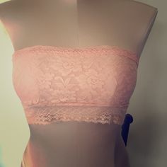 Never Worn. Light Pink Lace, Jersey Lined In Front, Sheer In The Back. Seamless Lace Bandeau Bra, Lace Strapless Tube Top Bra Friendly, Lace Strapless Bra-friendly Tube Top, Stretch Lace Bandeau Tube Top, Lace Bra-friendly Strapless Tube Top, Bra Friendly Lace Strapless Tube Top, Strapless Seamless Pink Crop Top, Stretch Lace Strapless Tube Top, Feminine Stretch Bandeau Tube Top