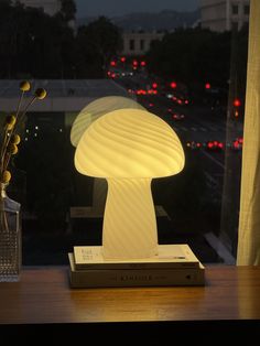 Transform your space with the enchanting glow of our Mushroom Table Lamp. 🍄✨ Elevate your home decor with its delicate frosted glass design and warm, illuminating light. Embrace elegance in every corner. Shop the mushroom and more during our black friday sale! Get 20% off the Mushroom Lamp! #HomeDecor #InteriorDesign Frosted Glass Design, Mushroom Table Lamp, Mushroom Table, Corner Shop, Warm White Light, The Mushroom, Mushroom Lamp, Led Table