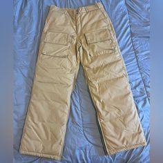 - Super Sick Vintage Cabela’s Snow/Hunting Pants. Insulted With Waterfowl Down For A Very Warm And Cozy Fit. 6 Pockets Total, Two Zip Pockets In The Back And 2 Cargo Pockets In The Front. - Size Medium - Fantastic Condition With No Visible Flaws Cabelas Hunting Snow Winter Insulation Hunter Heavy Duty Work Workwear Work Wear Mens Men’s Heavyweight Pants Trousers Outdoor Outdoors Adventure Forest Woods Brown Tan Big Game Hunting Winter Utility Full-length Pants, Winter Utility Pants, Utility Parachute Pants For Winter, Full Length, Winter Utility Full-length Parachute Pants, Winter Utility Full Length Parachute Pants, Winter Utility Style Full-length Parachute Pants, Winter Outdoor Pants With Belt Loops, Adventure Forest, Game Hunting