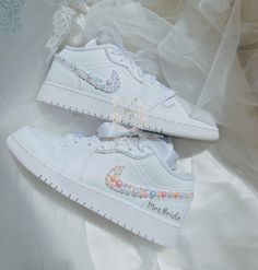 -This is a custom Bridal sneaker.  -Option 1 is only Name and date -Option 2 has pearls on the outer 2 swooshes and names and dates. -Offers more designs and colors of pearls/check out my store/ -Open for custom requests. TURNAROUND TIME: -2 weeks to be crafted just for you -Shipping will take an additional 3-7 business days. -We offer FREE shipping within the US. -EXPEDITED service available Visit the link below for EXPEDITED SERVICE: https://perfctpairings.etsy.com/listing/1537883783 for PURCH White Low-top Wedding Shoes For Bride, White Low-top Wedding Shoes For Bridal Shower, Custom White Wedding Sneakers, Customizable White Sneakers For Wedding, White Round Toe Sneakers For Bridal Shower, White Low-top Bridal Sneakers, Customizable White Wedding Sneakers, Custom Wedding Sneakers With Round Toe And Laces, Customizable Low-top Wedding Shoes For Bride