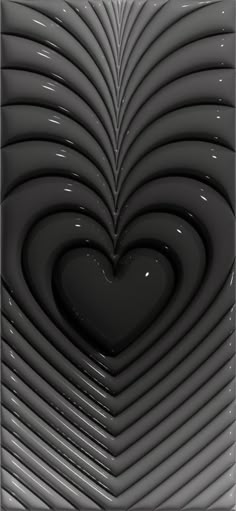 an abstract black and white photo with a heart shaped object in it's center