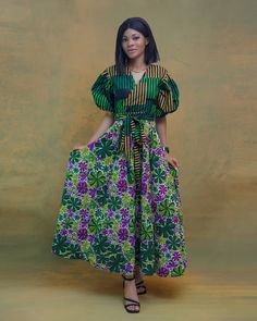 Ankara fit and flare dress made with 💯African print. Ankara mix match, puffy sleeves, has 2 sides pocket. Green Floral Print Puff Sleeve Maxi Dress, Green Puff Sleeve Maxi Dress With Floral Print, Green Puff Sleeve Dress With Floral Print, Casual Short Sleeve Maxi Dress With Gathered Sleeves, Multicolor V-neck Dress With Gathered Sleeves, Short Sleeve Dresses With Mixed Print, Ankara Jumpsuit, Ankara Gowns, Ankara Dress