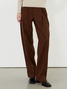 Editor's NotesIt's a trouser pants with pin tuck details that's good to wear in the F/W season. The wide line and the length that overturns the foot are attractive and the thick texture makes you warm. - Wide line- Length covering the top of the foot- Thick and soft texture- Comfortable and warm fit Measurements(in.)Size (S/M)- Waist: 13 in. / 13.8 in.- Rise: 11.42 in. / 11.61 in.- Hip: 18.11 in. / 19.1 in.- Thigh: 12.02 in. / 13 in.- Hem: 9.06 in. / 9.45 in.- Total length: 40 in. / 40.6 in. * Sizing inconsistency may occur within 0.4 inchesto 1.18 inches.* Model info: Height 5'7 / Wearing Size S Composition &Care- 80% Polyester, 18% Rayon, 2% Span- Dry Clean- Do Not Tumble Dry Designer- by EIGHT DAYS A WEEK Fall Pleated Straight Leg Bottoms, Brown Relaxed Fit Wide Leg Pants For Work, Brown Wide Leg Pants With Relaxed Fit For Work, Pleated Tapered Leg Bottoms For Fall, Pleated Brown Bottoms For Fall, Fall Pleated Tapered Leg Bottoms, Brown Relaxed Fit Wide Leg Work Pants, Fall Pleated Straight Pants, Brown Pleated Bottoms For Workwear