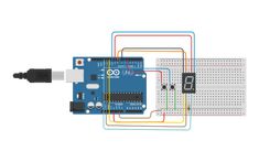 an electronic device connected to a breadboard