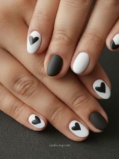 Looking for a sleek and modern Valentine's Day nail look? Try Black and White Nail Art for Valentine's Day! 🖤🤍 This bold and stylish design combines classic black and white shades with a romantic twist, perfect for the season of love. #ValentinesDayNails #BlackAndWhiteNails #ShortNailIdeas #ValentinesNailDesigns #ChicNailArt #MinimalistNails #RomanticNailDesign #NailArtInspiration