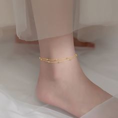 Description & Details This anklet can be worn to show off not only unique temperament but also beautiful skin. It can be worn by yourself or given as a gift.• Material: Solid 925 Sterling Silver• Finish: Hypoallergenic ∙ Gold Plating• Dimensions: 20 - 25 cm chain, adjustable• All our work is custom made by hand with love Trendy Hypoallergenic Anklets For Gifts, Elegant Hypoallergenic Anklets For Summer, Minimalist Anklets For Gift, Elegant Hypoallergenic Anklets For Gifts, Adjustable Hypoallergenic Anklets, Elegant Hypoallergenic Gold Anklets, Elegant Adjustable Tarnish-resistant Anklets, Silver Adjustable Chain Anklet, Dainty Adjustable Nickel-free Anklets