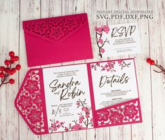 pink and white wedding stationery with laser cut flowers on the front, envelope and inside