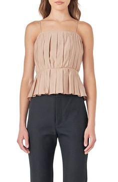 Elevate your warm-weather style with this light and airy peplum top fashioned with impeccable pleats. Square neck Adjustable straps Lined 75% rayon, 25% polyester Hand wash, dry flat Imported Dressed Down, Everyday Look, Womens Clothing Tops, Search Engine, Peplum Top, Spaghetti Strap, Fashion Forward, Top Styles, Night Out