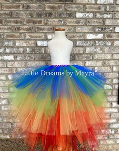 Welcome to Little Dreams by Mayra Tutus are fun and easy to match with any accessory so I am offering this tutu, its available in any color, any size! *If you need a color combination just send me a message at checkout you will select the longer Lenght of the tutu from waist to floor, this length will be in the back and will go shorter from there, you can provide me your information or you can follow my chart COLOR you can choose any combination, last pic has my chart tutu skirt in main pics has Playful Rainbow Tutu Dress For Spring, Fun Multicolor Tutu Dress For Dress-up, Princess Style Rainbow Tutu Dress For Spring, Spring Princess Rainbow Tutu Dress, Spring Princess Tutu Dress In Rainbow Colors, Spring Princess Tutu Dress In Rainbow, Playful Multicolor Tulle Tutu Dress, Multicolor Playful Tulle Tutu Dress, Multicolor Tulle Skirt For Summer