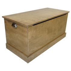 a large wooden box sitting on top of a white floor