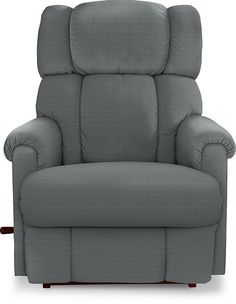 the reclining chair is shown in tan leather