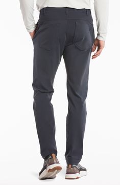 Stay comfy on or off the course in nylon performance pants built with stretch and a roomier fit that slightly tapers off at the ankle. The secure zip pocket helps safely store smaller essentials so you can keep your focus on the game. Zip fly with button closure Front slant pockets; hidden side-zip pocket; back welt pockets 88% nylon, 12% spandex Machine wash, tumble dry Imported Golf Bottoms With Pockets And 4-way Stretch, Casual Stretch Golf Pants, Casual Stretch Pants For Golf, Functional Nylon Bottoms With 4-way Stretch, Moisture-wicking Tapered Leg Pants With 4-way Stretch, Functional Moisture-wicking Bottoms For Golf, Functional Midweight Bottoms With Comfort Waistband, Versatile Nylon Pants With 4-way Stretch, Versatile 4-way Stretch Pants With Functional Pockets