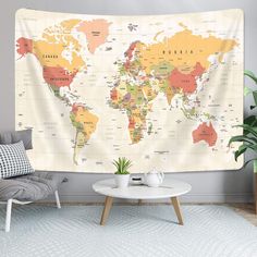 a living room with a large map tapestry hanging on the wall