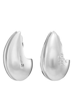 Grooved wave clip-on earrings offer sophisticated shine with an embossed logo and highly polished finish. 3/4"W x 1 3/4"L Clip-on style Goldtone or silvertone plate Imported Luxury Silver Clip-on Earrings With Polished Finish, Classic White Gold Clip-on Earrings With Polished Finish, Drop Design, Ring Watch, Demi Fine Jewelry, Iconic Bags, Fine Watches, Boots Fall, Drops Design