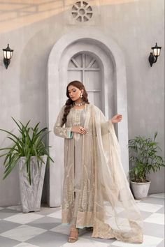 Material - Fabric: Modal and Georgette, Dupatta is net You will receive - Ready to wear salwar kameez and dupatta Size Guide The Size Of The Garment Ready On The Chest, Sizes In Inches Will Be The Following, (XS-34), (S-36), (M-38), (L-40), (XL-42), (2XL-44), (3XL-46), (4XL-48) Care Instructions - The first wash of the garment should always be Dry-Cleaned Note Due to the light and screen setting difference, the item's color may be slightly different from the pictures. Wedding Salwar Kameez In Chinon With Naqshi Detailing, Wedding Salwar Kameez In Georgette With Naqshi Detailing, Wedding Salwar Kameez In Georgette With Naqshi, Wedding Salwar Kameez With Naqshi In Georgette, Bollywood Style Dabka Lawn Suit For Reception, Bollywood Style Lawn Suit With Dabka For Reception, Organza Salwar Kameez With Naqshi For Reception, Wedding Anarkali Set In Georgette With Naqshi, Bollywood Style Naqshi Salwar Kameez For Reception