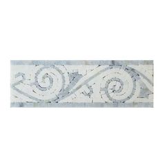 a white and grey tile border with swirls