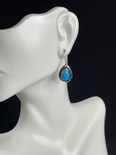 "Don't miss out on this brand new amazing high quality handcrafted sterling silver with 7x10mm pear shape natural genuine American Blue Sleeping Beauty Turquoise stones. The turquoise stones come from the Sleeping Beauty Turquoise mine in Globe, Arizona and the mine is closed so Sleeping Beauty Turquoise will be rare in the market. The Earrings are handcrafted in the USA and stones are bezel set on solid 925 sterling silver. Our silver is genuine 925 sterling silver and stamped with 925. Earring Nickel-free Teardrop Turquoise Hoop Earrings, Nickel-free Turquoise Teardrop Hoop Earrings, Globe Arizona, Sleeping Beauty Turquoise Jewelry, Whimsical Turquoise Nickel-free Earrings, Nickel-free Sterling Silver Turquoise Chandelier Earrings, Sleeping Beauty Turquoise, Silver Dangle Earrings, Turquoise Stones