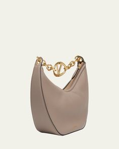 Valentino Garavani moon hobo bag in leather    VLOGO chain shoulder strap     Zip top closure     Lining: Leather    Approx. 13.6"H x 12.8"W x 4.3"D    Made in Italy Luxury Hobo Bag With Palladium Hardware, Luxury Evening Hobo Bag With Palladium Hardware, Elegant Hobo Bag With Chain Strap, Luxury Evening Hobo Bag With Branded Hardware, Luxury Hobo Bag With Branded Hardware For Evening, Elegant Hobo Bag With Chain Strap For Formal Occasions, Elegant Chain Strap Hobo Bag For Formal Occasions, Modern Evening Hobo Bag With Chain Strap, Luxury Hobo Bag With Branded Hardware