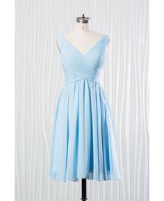 a blue dress on a mannequin dummy