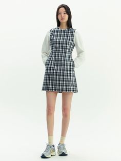 Cut from soft cotton fabric, this dress has unique layered silhouette. It is accentuated with cute check pattern and tucked waist for a slim fit. - Lightweight, crisp cotton oxford- Casual round neckline and long sleeves- Back zip fastenings- Semi A-line hem- Side concealed pockets Plaid Mini Dress For Work, Chic Plaid Cotton Dress, Spring Plaid Mini Dress For Work, Chic Plaid Cotton Midi Dress, Gingham Mini Dress For Work, Spring Workwear Plaid Mini Dress, Chic Plaid Mini Dress For Daywear, Cotton Plaid Mini Dress, Plaid Cotton Mini Dress