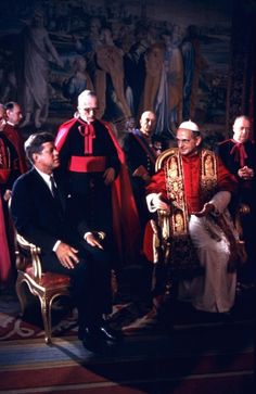 a group of men sitting next to each other