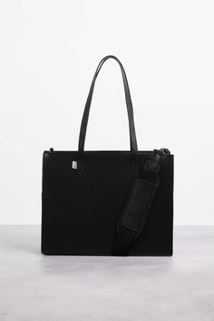 Mini Tote Bag in Black | Béis Travel Rectangular Laptop Bag With Removable Pouch For Work, Large Capacity Tote Briefcase For Work, Briefcase With Removable Pouch Shoulder Bag, Workwear Laptop Tote Bag With Detachable Strap, Workwear Tote Laptop Bag With Detachable Strap, Workwear Briefcase With Removable Shoulder Pouch, Chic Briefcase With Removable Pouch For Work, Versatile Leather Laptop Bag For Work, Workwear Briefcase With Removable Pouch