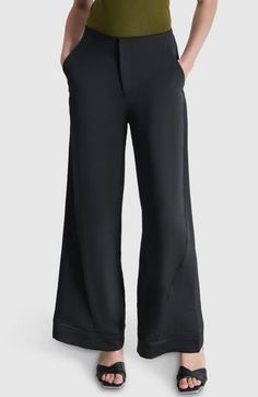 A clean waist gives way to a gracefully widened leg in staple pants that move from desk to dinner with elegant ease. Zip fly with hook-and-bar closure Front slant pockets; back welt pocket 100% polyester Dry clean or machine wash, tumble dry Imported Staple Pants, Nordstrom Store, Anniversary Sale, Black Fits, Tumble Dryer, Welt Pocket, Bottoms Pants, Leg Pants, Wide Leg Pants