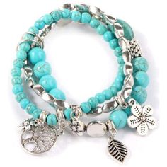 Invoke energy from the nature around you with this turquoise beaded bracelet and its beautiful silver charms - the Tree of Life, feather, and flower. This set of three bracelets comes with adjustable and stretchable bead pieces. Typically delivers within 2-4 business days! 1032 Hollow Tree, Turquoise Bead Bracelet, Women Bracelet, Bracelet Online, Bleu Turquoise, Leaf Flowers, Turquoise Beads, Turquoise Blue, Silver Charms