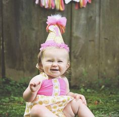 So cute for your special celebration! Cardstock party hat. Standard size. A layered ribbon bow and feather topper tops the hat. Coordinating trims accent the base. Layered cardstock number highlights the age of your choice. Personalization can be added with an optional personalized balloon cutout. Balloon cutout includes a gemstone and is attached to the number on the hat. Finally, a cutout to match your theme adorns the hat. Adjustable elastic strap will hold the hat securely on your little one Cute Summer Birthday Party Supplies, Cute Birthday Party Supplies For Summer, Cute Summer Birthday Hat, Cute Birthday Hats For Spring, Cute Hats For Birthday In Spring, Sunshine Birthday Party, Sunshine Birthday Parties, Sunshine Birthday, Yellow Chevron