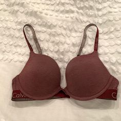 1- Burgundy Lightly Lined Demi Calvin Klein Bra Brand New W/O Tags Subtle Lining For Shape And Support Adjustable And Convertible Straps 58% Modal 27% Polyester 15% Elastane Made In India I Bought The Wrong Size Will Trade For 36b :) Last Picture To Show Fit Check Out My Other Calvin Klein And Tommy Hilfiger Listings. Add To A Bundle For A Bundling Discount Calvin Klein Fitted Underwire Bra, Calvin Klein Fitted Sports Bra, Calvin Klein Fitted Seamless Bra, Bras Calvin Cliem, Calvin Klein Seamless Bra, Calvin Klein Bra, Calvin Klein Red, White Bras, Bra Brands