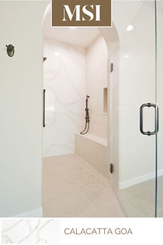 a bathroom with a glass shower door and white tile flooring that has the words msi on it