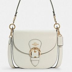 Gorgeous Classy Coach Shoulder Bag In Chalk With Goldtone Hardware! Largest Version Host Pick Refined Pebble Leather Inside Multifunction Pocket Magnetic Snap Closure, Fabric Lining Detachable Handle With 8 3/4" Drop Outside Zip Pocket Detachable Strap With 21 3/4" Drop For Shoulder Or Crossbody Wear 8 3/4" (L) X 8 3/4" (H) X 3 1/4" (W) Retail $450+Tax All Of My Listing Are Cross Listed White Satchel With Branded Hardware For Evening, Classic White Shoulder Bag With Branded Hardware, White Shoulder Bag With Silver-tone Hardware For Office, White Coach Evening Bag, Formal White Coach Shoulder Bag, White Satchel With Detachable Strap For Work, White Coach Shoulder Bag For Formal Occasions, Elegant White Satchel With Silver-tone Hardware, White Bags With Branded Hardware For Office