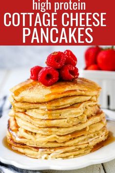 high protein cottage cheese pancakes with raspberries on top