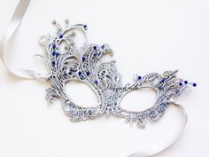 "Beautiful butterfly Mask dazzling with rhinestones. If you have sensitive eyes, this wide opening mask is a good option. It also allows for dramatic eye makeup to show and is also ideal to wear with eye glasses. S H I P P I N G - Last minute Masquerade Mask shopping? Processed same day or within 24 hours. 1-2 day guaranteed delivery services offered, add items to cart and click on shipping tab for rates. Pls leave a check out note with your need date & contact number (especially for expedit Elegant Silver Masks As Gift, Handmade Fantasy Masquerade Mask, Handmade Fantasy Style Masquerade Mask, Handmade Eye Mask For Costume Masquerade, Handmade Eye Mask For Masquerade Costume, Fantasy Style Eye Mask For Masquerade, Elegant Masquerade Mask For Carnival Gift, Handmade Masquerade Mask For Carnival, Elegant Mardi Gras Masks And Prosthetics